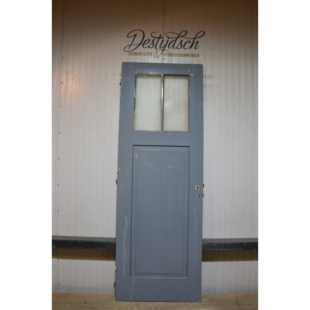 Oude drievaks paneeldeur met glas     