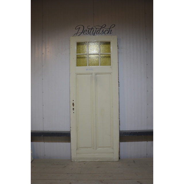 Oude paneeldeur met glas 