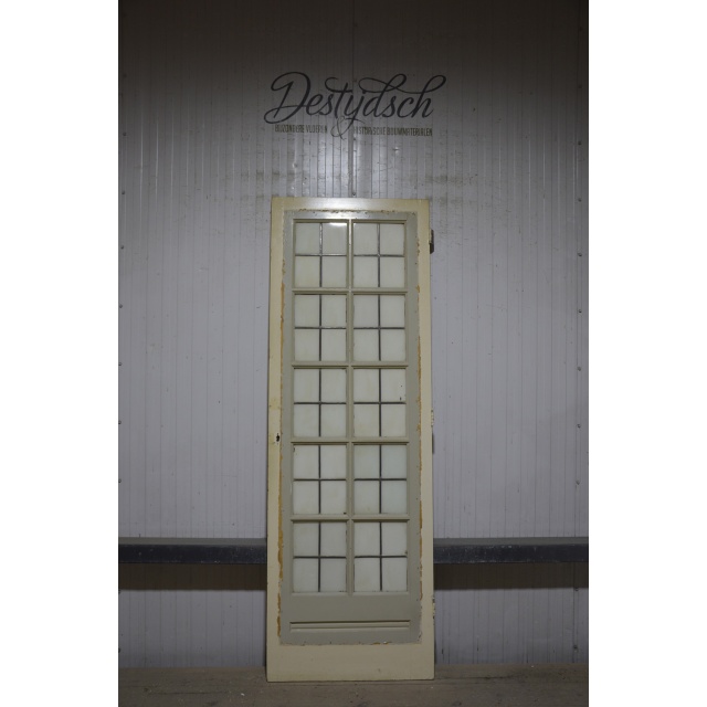 Oude deur met glas in lood