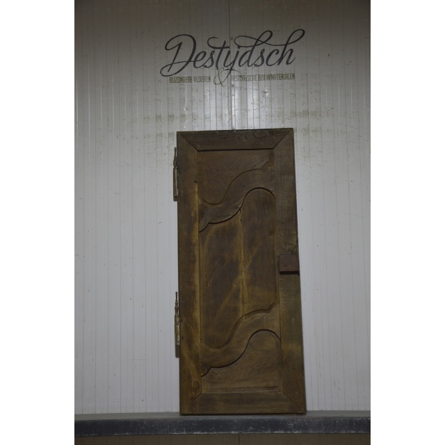 Oude geloogde kastdeur